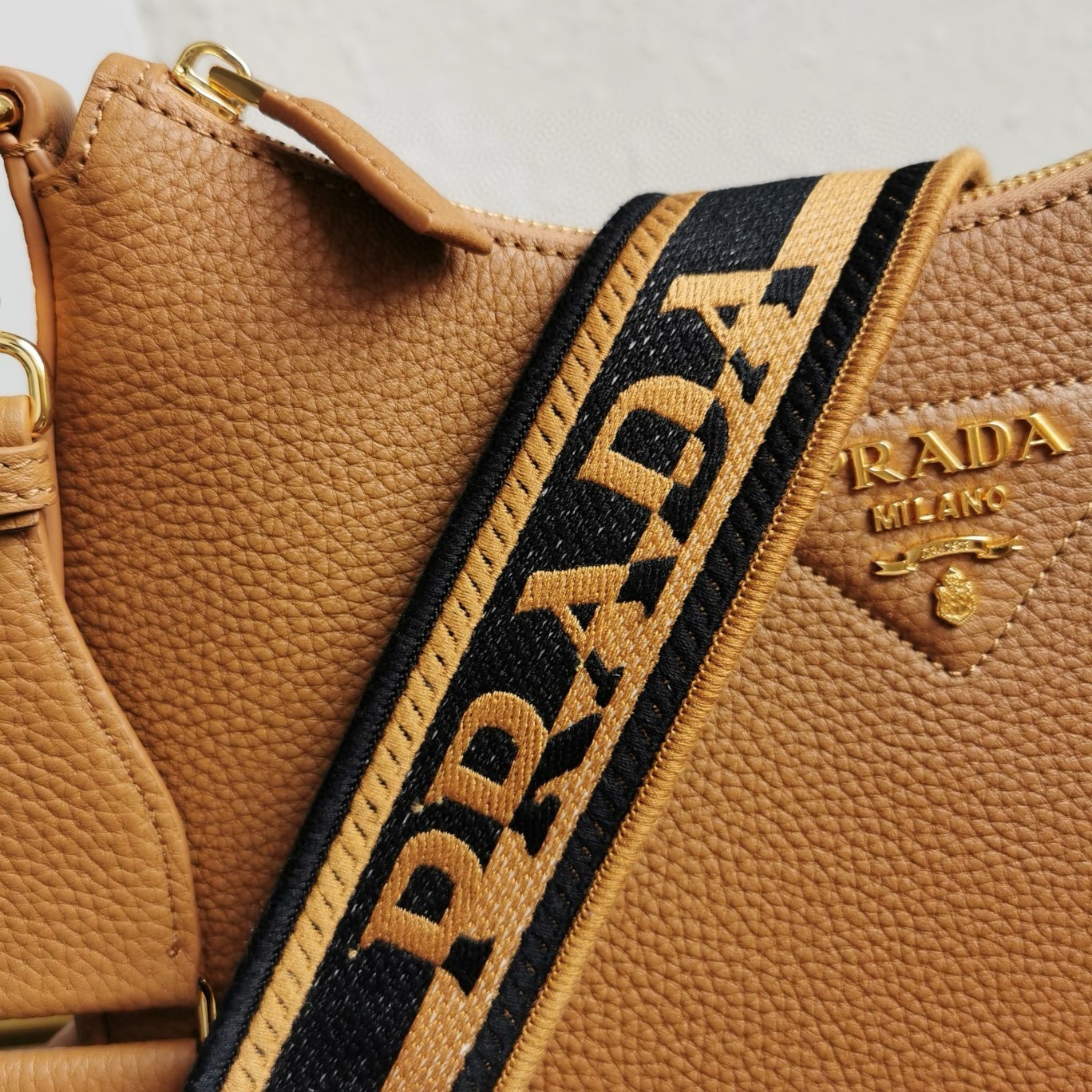 Pra*a shoulder bag in brown grained leather