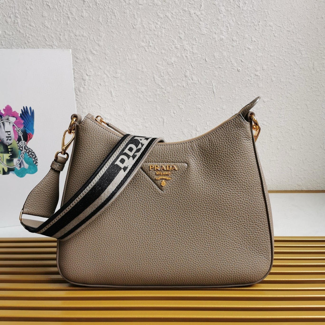 Pra*a shoulder bag in grey grained leather
