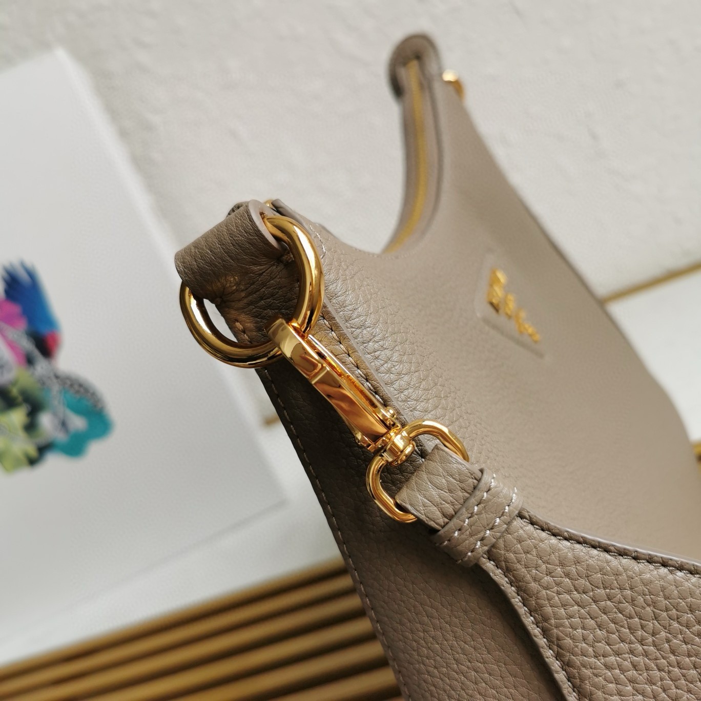 Pra*a shoulder bag in grey grained leather