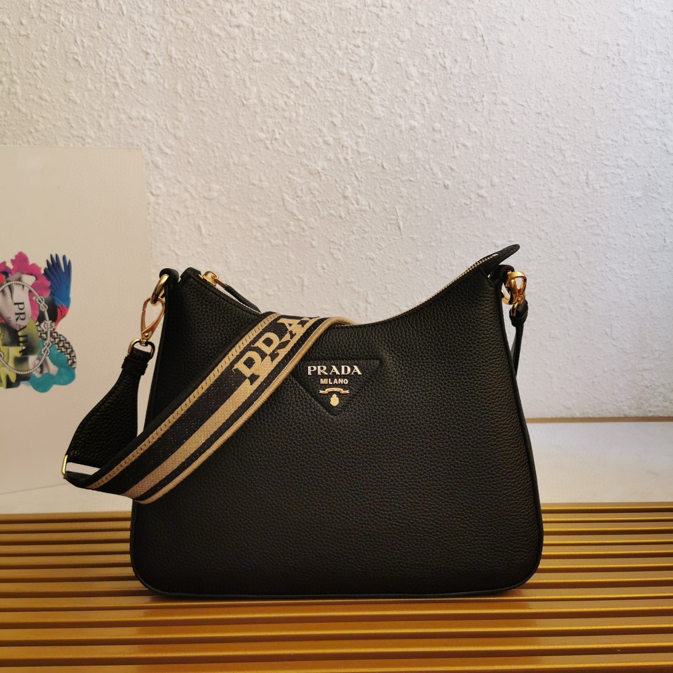 Pra*a shoulder bag in black grained leather