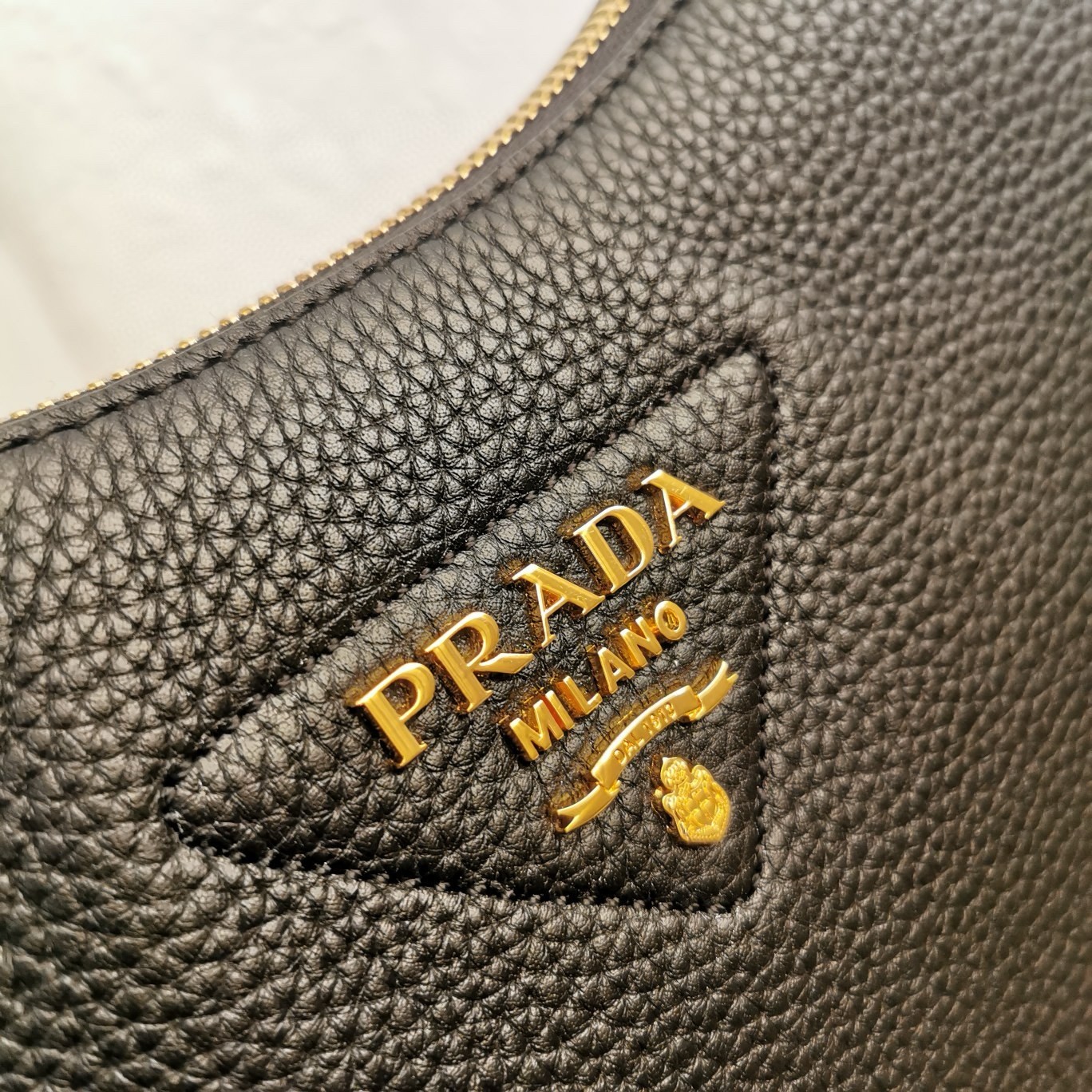 Pra*a shoulder bag in black grained leather