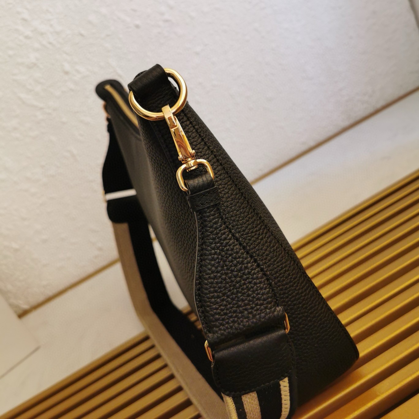 Pra*a shoulder bag in black grained leather