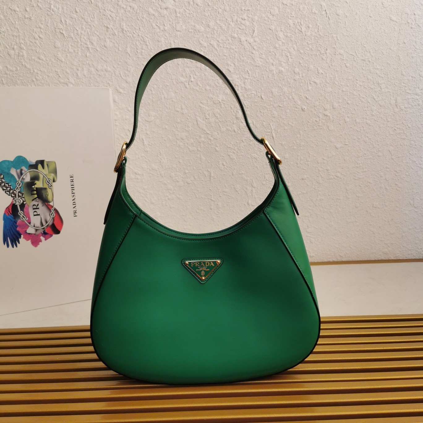 Pra*a shoulder bag in green leather
