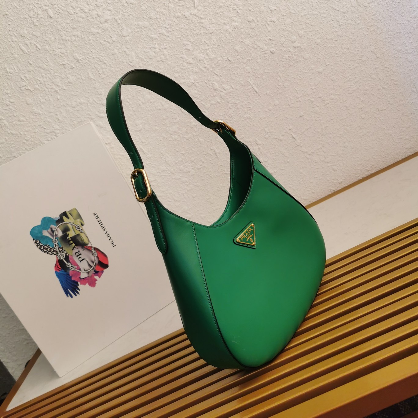 Pra*a shoulder bag in green leather