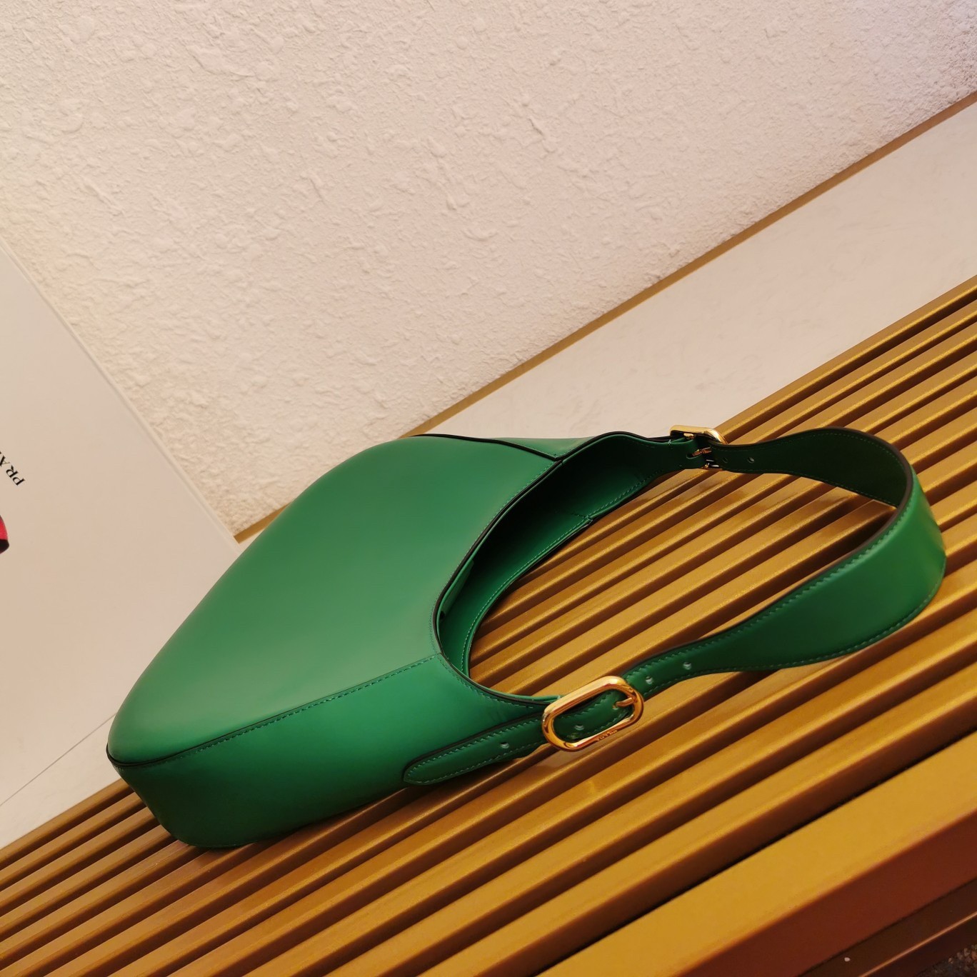 Pra*a shoulder bag in green leather