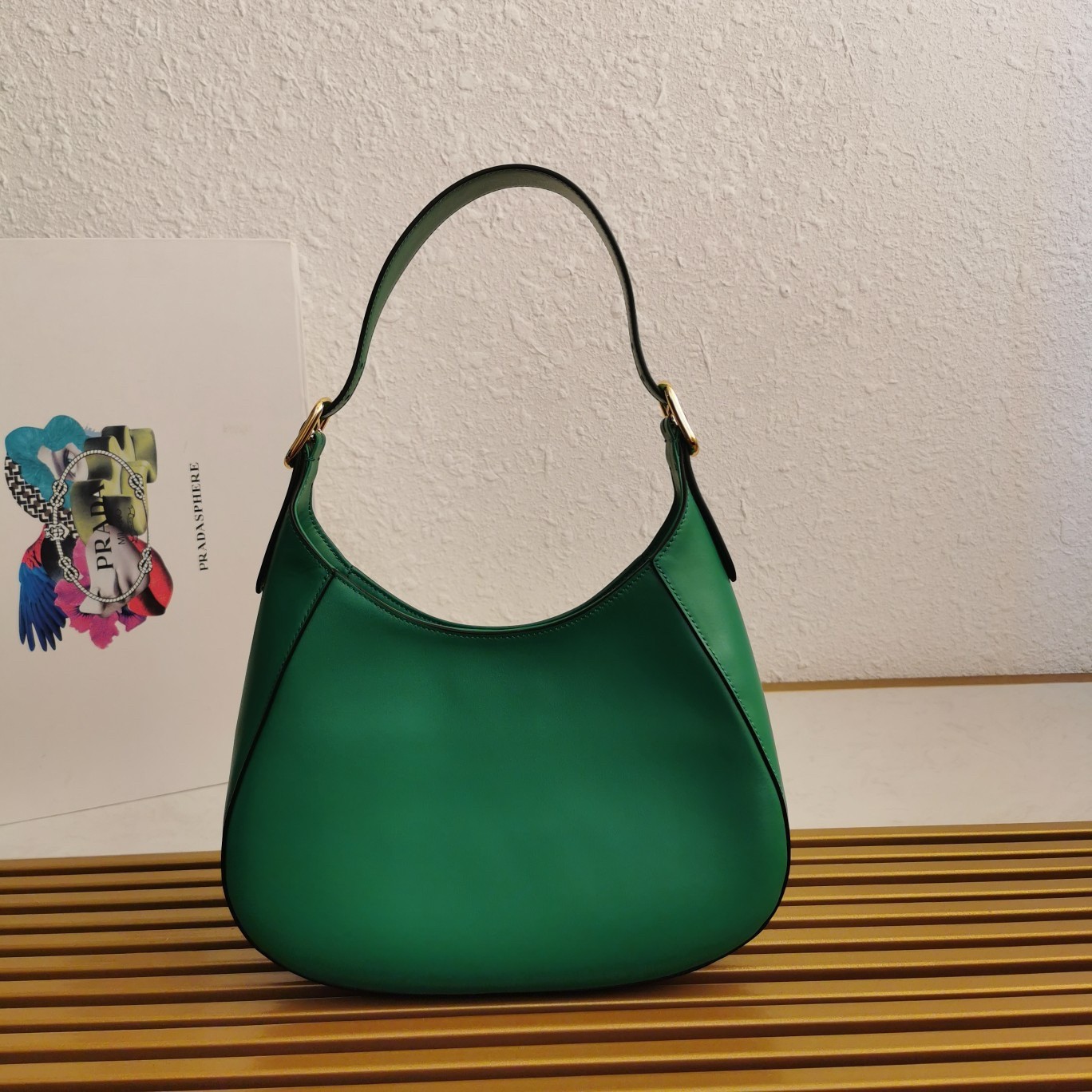 Pra*a shoulder bag in green leather