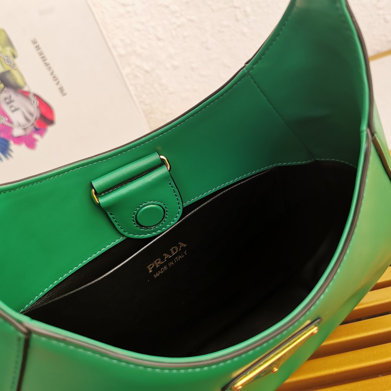 Pra*a shoulder bag in green leather