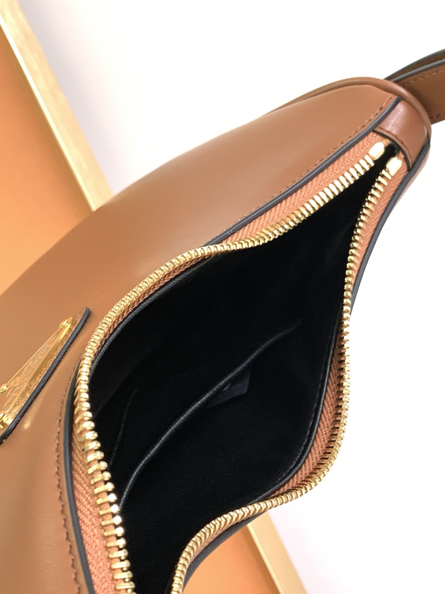 Pra*a arque shoulder bag in brown leather