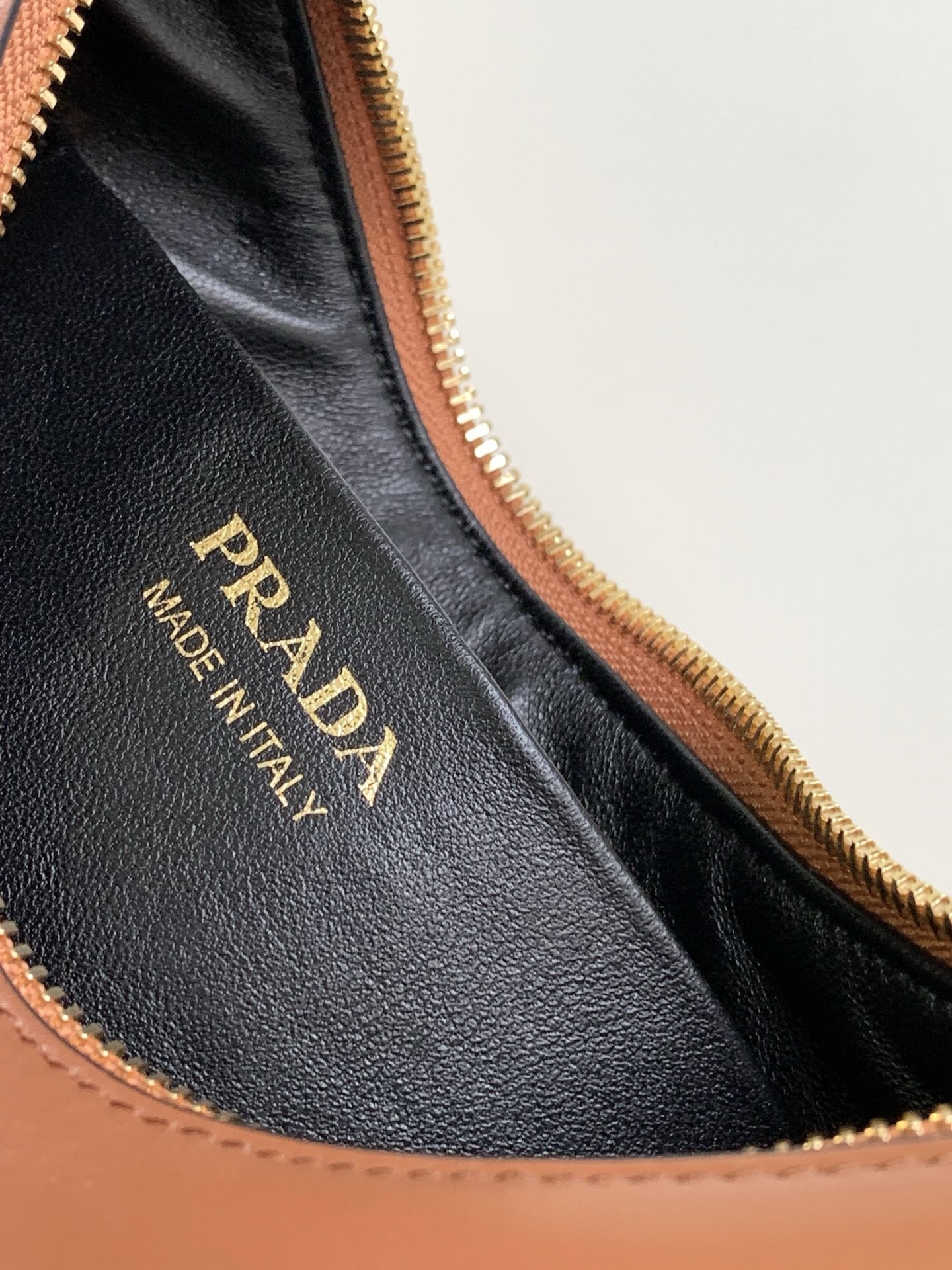 Pra*a arque shoulder bag in brown leather