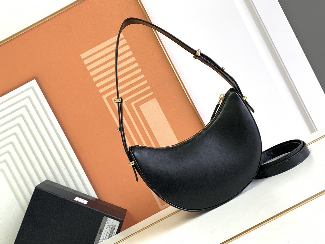 Pra*a arque shoulder bag in black leather