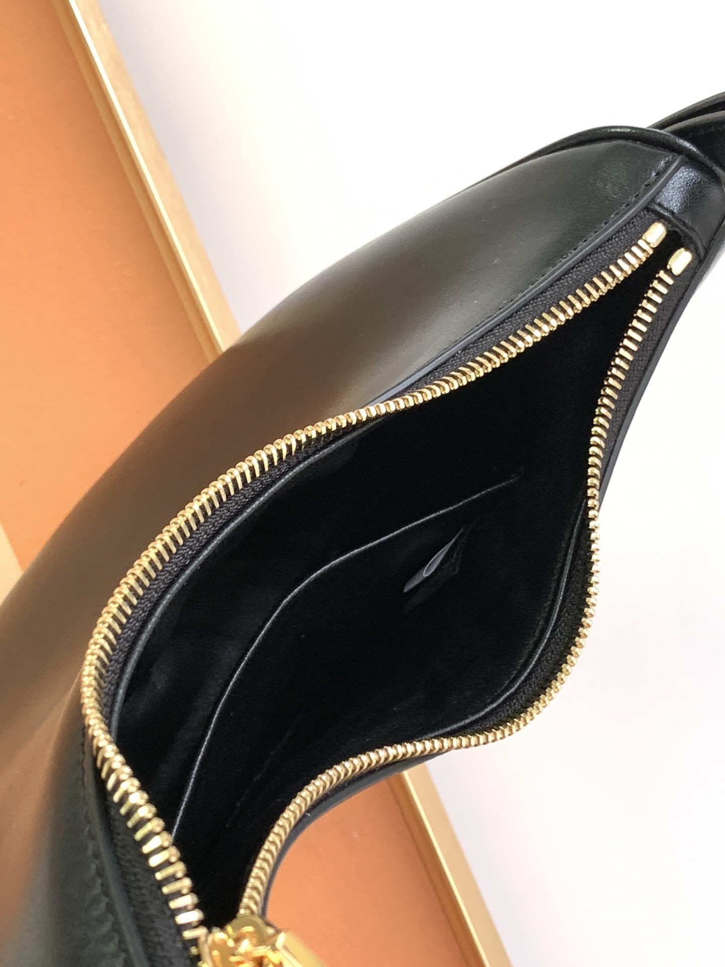 Pra*a arque shoulder bag in black leather