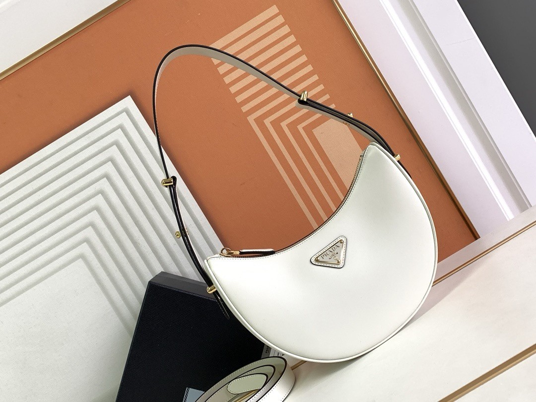 Pra*a arque shoulder bag in white leather