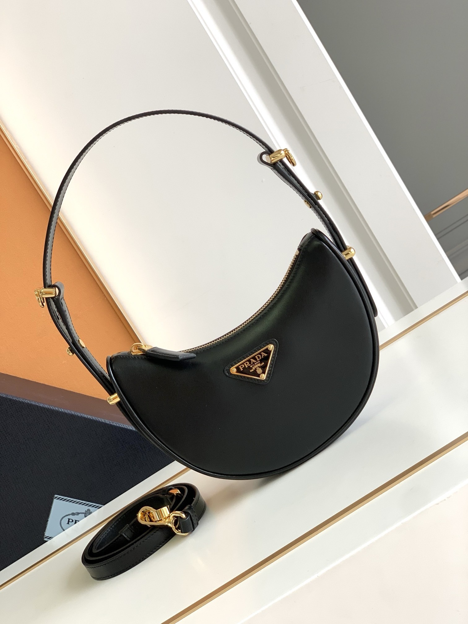 Pra*a arque mini shoulder bag in black leather