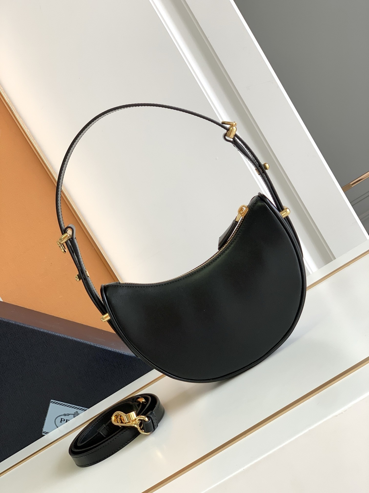 Pra*a arque mini shoulder bag in black leather