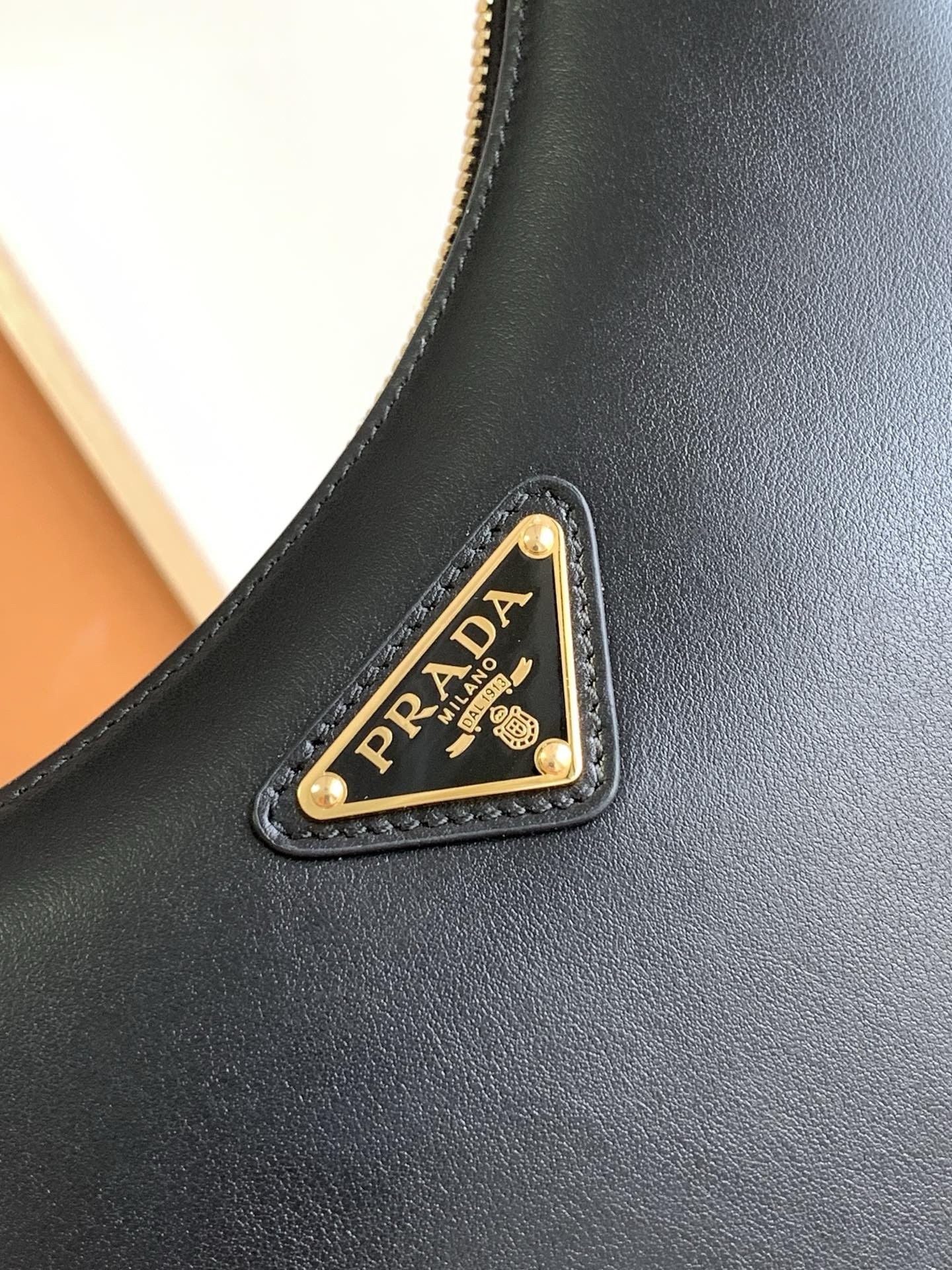 Pra*a arque mini shoulder bag in black leather