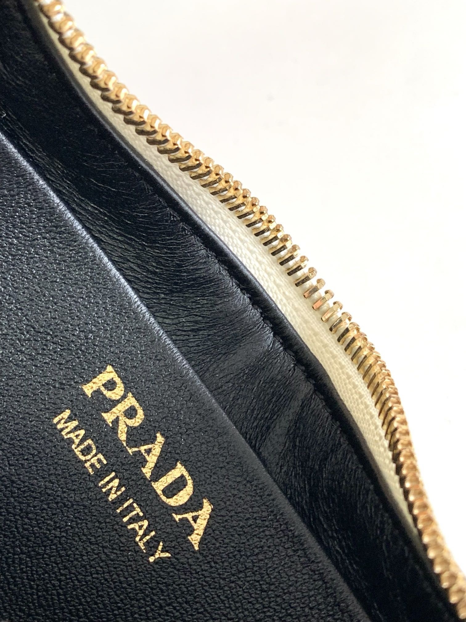 Pra*a arque mini shoulder bag in white leather