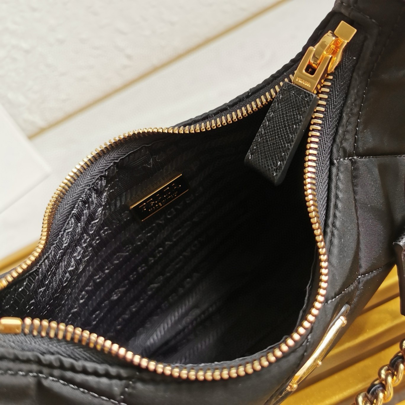 Pra*a re-edition 1995 chaine mini bag in black re-nylon