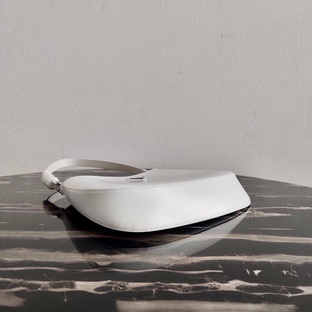 Pra*a cleo small shoulder bag in white brushed leather