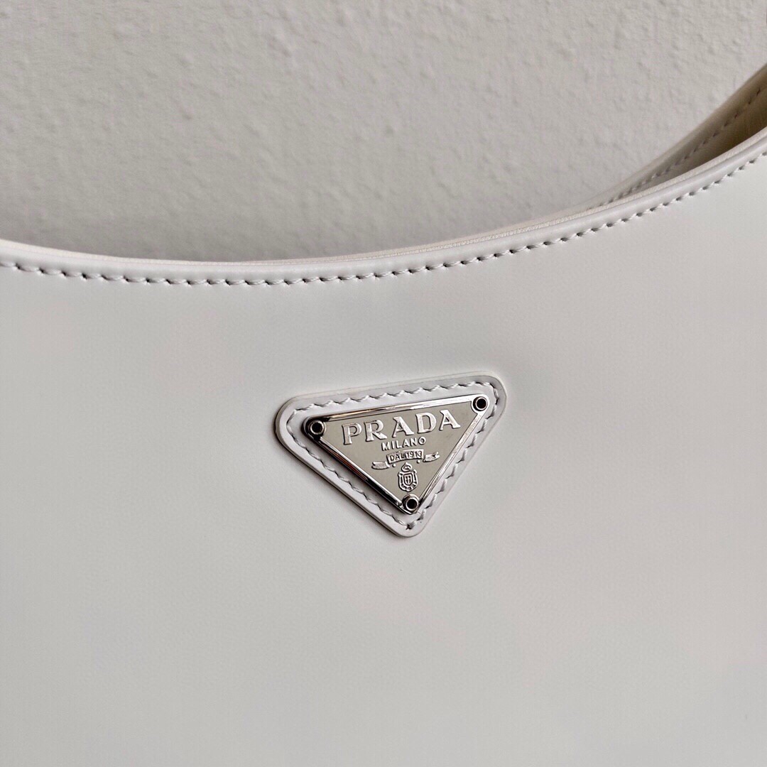 Pra*a cleo small shoulder bag in white brushed leather