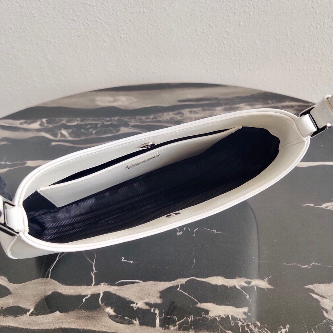 Pra*a cleo small shoulder bag in white brushed leather