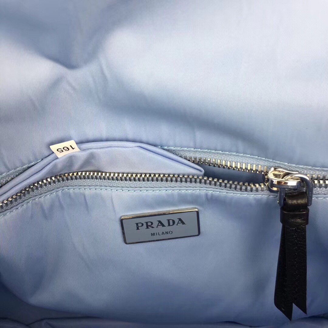 Pra*a etiquette bag in nylon with metal stud trim