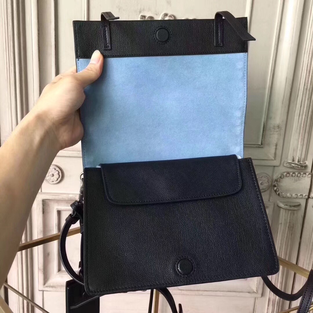 Pra*a etiquette bag in black calfskin with metal stud trim