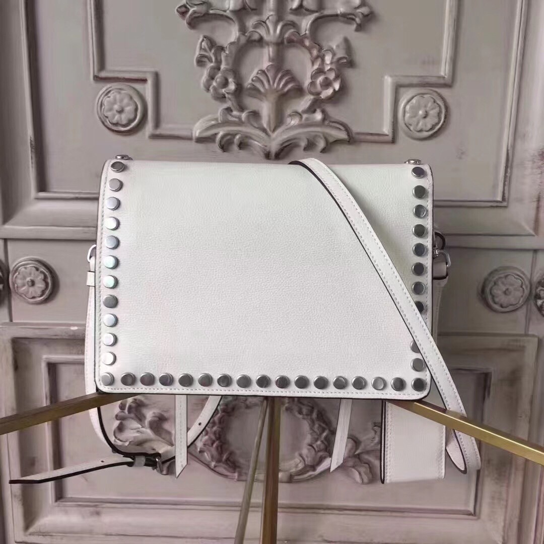 Pra*a etiquette bag in white calfskin with metal stud trim