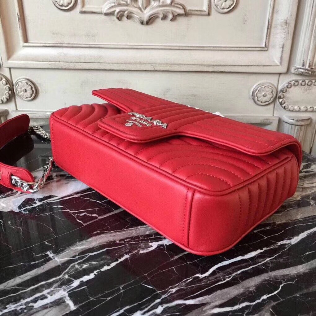 Pra*a diagramme flap bag in red calfskin