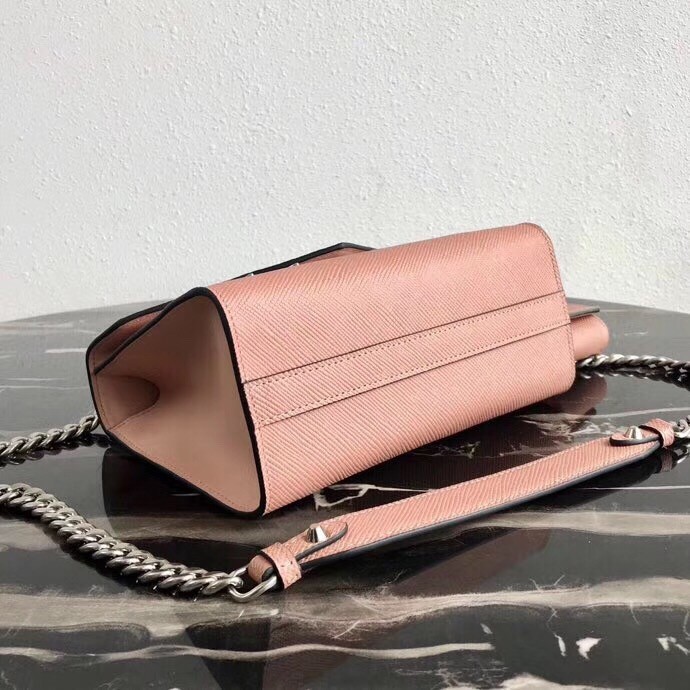 pra*a nude monoCh*0me flap bag with metal appliques