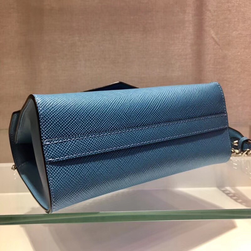 pra*a monoCh*0me flap bag in blue saffiano leather