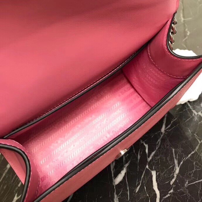 pra*a monoCh*0me flap bag in begonia pink saffiano leather
