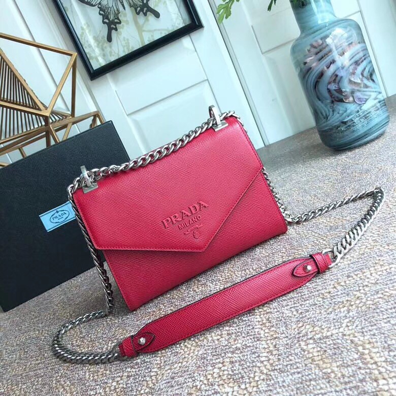 pra*a monoCh*0me flap bag in red saffiano leather