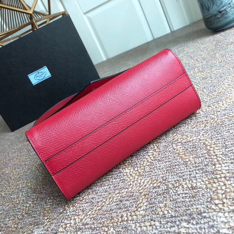 pra*a monoCh*0me flap bag in red saffiano leather