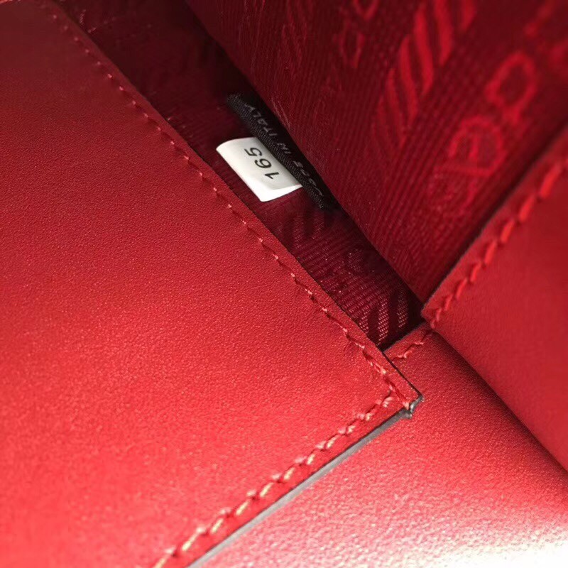 pra*a monoCh*0me flap bag in red saffiano leather