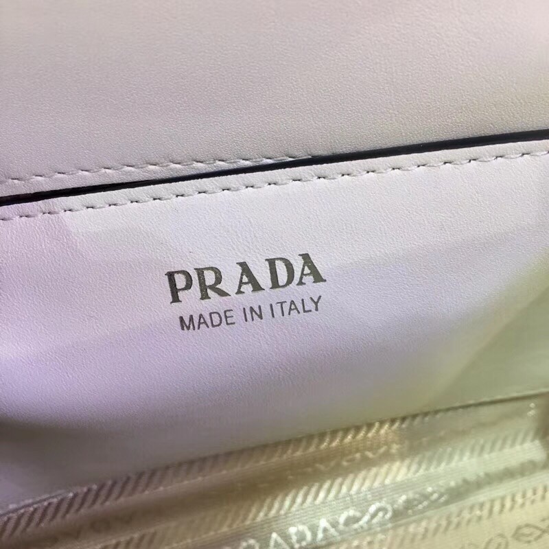 pra*a monoCh*0me flap bag in white saffiano leather