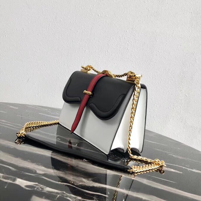 Pra*a belle shoulder bag in black/white calfskin
