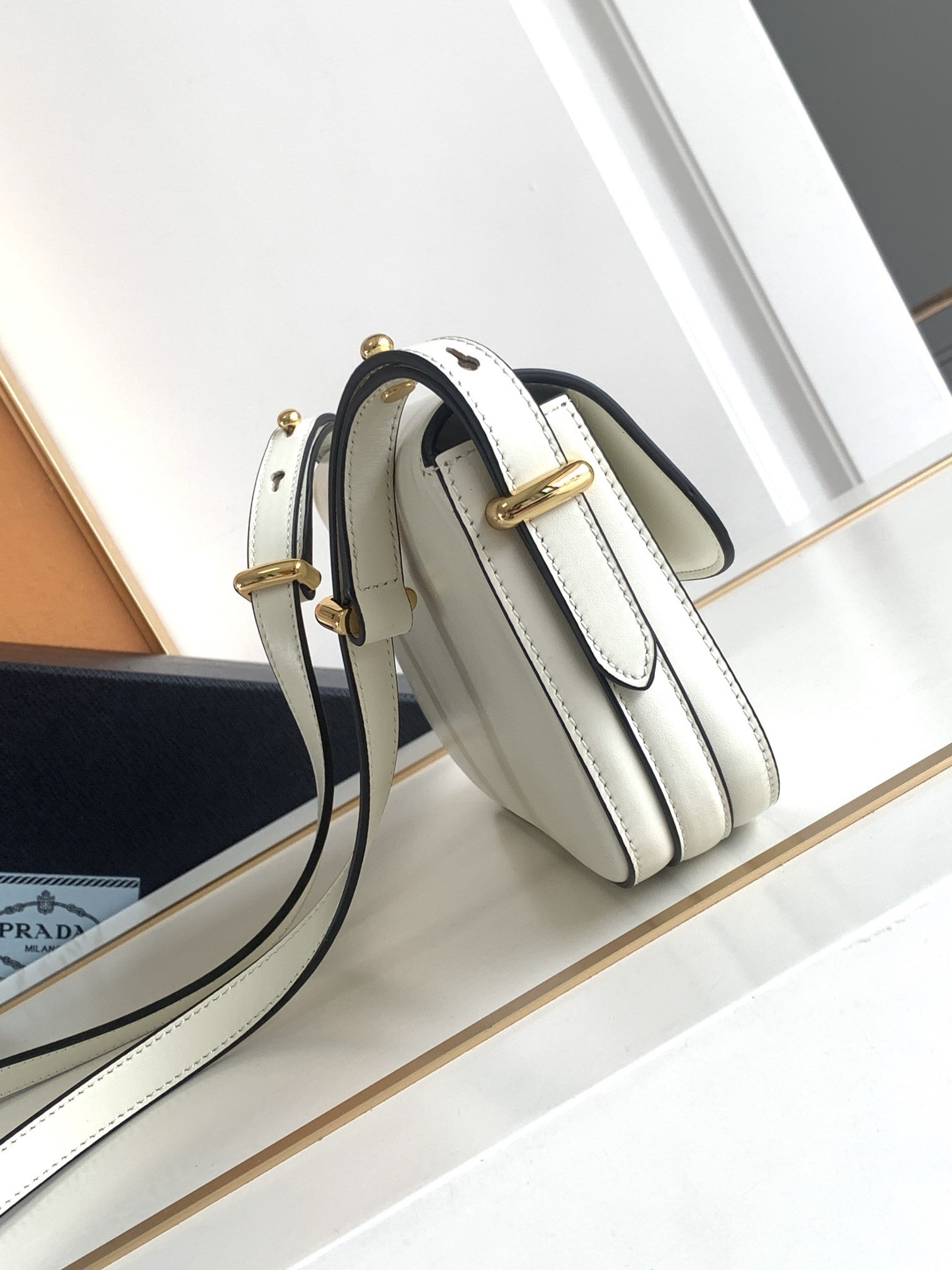 Pra*a shoulder bag in white smooth calfskin