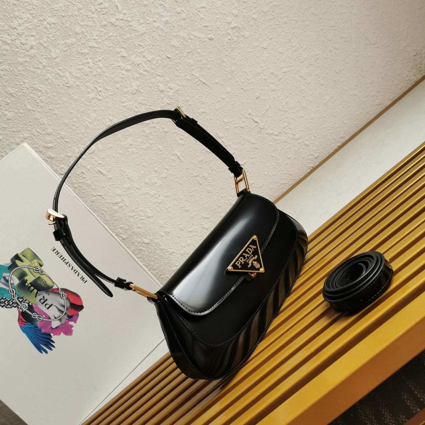 Pra*a shoulder bag in black brushed calfskin