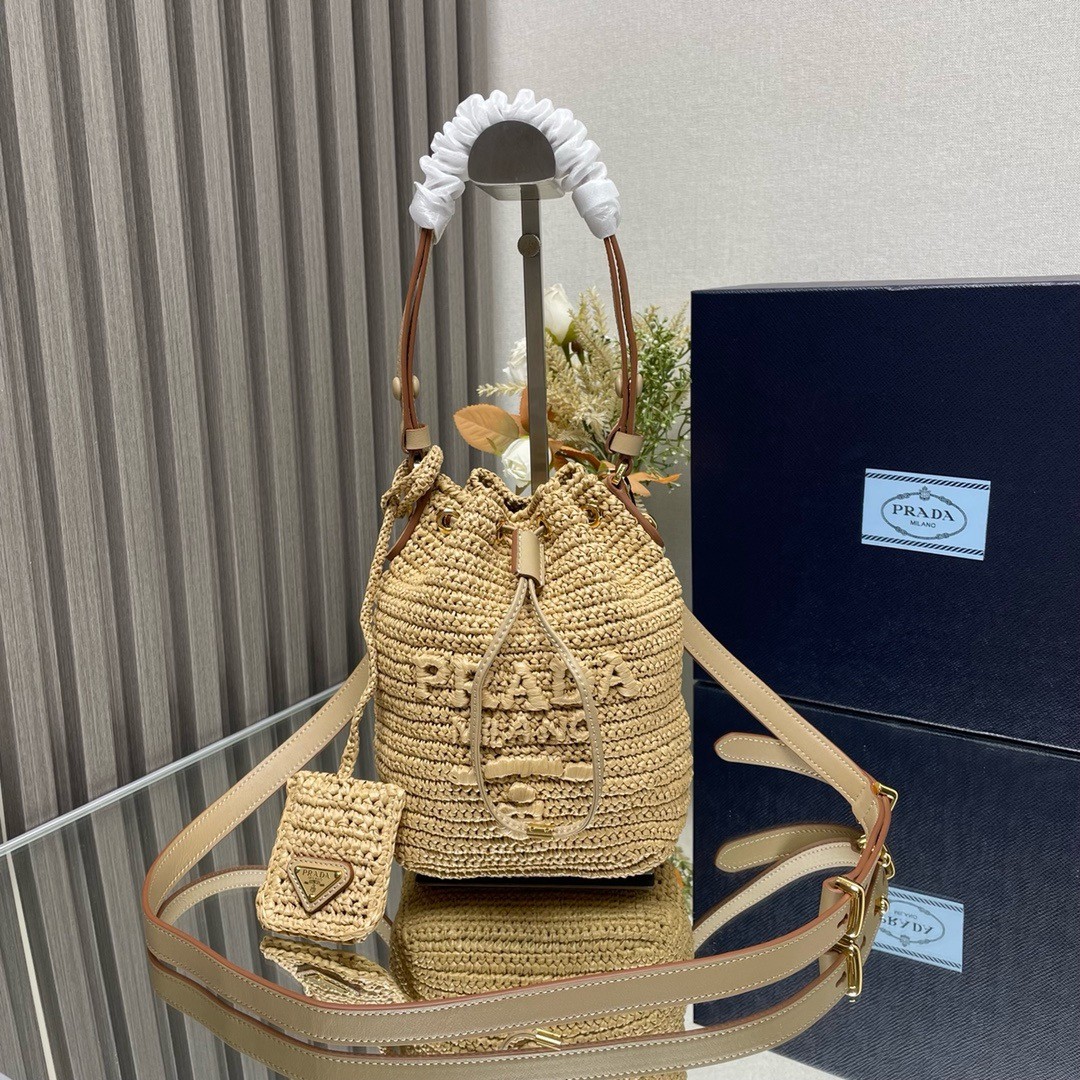 Pra*a crochet mini bucket bag in natural raffia-effect yarn
