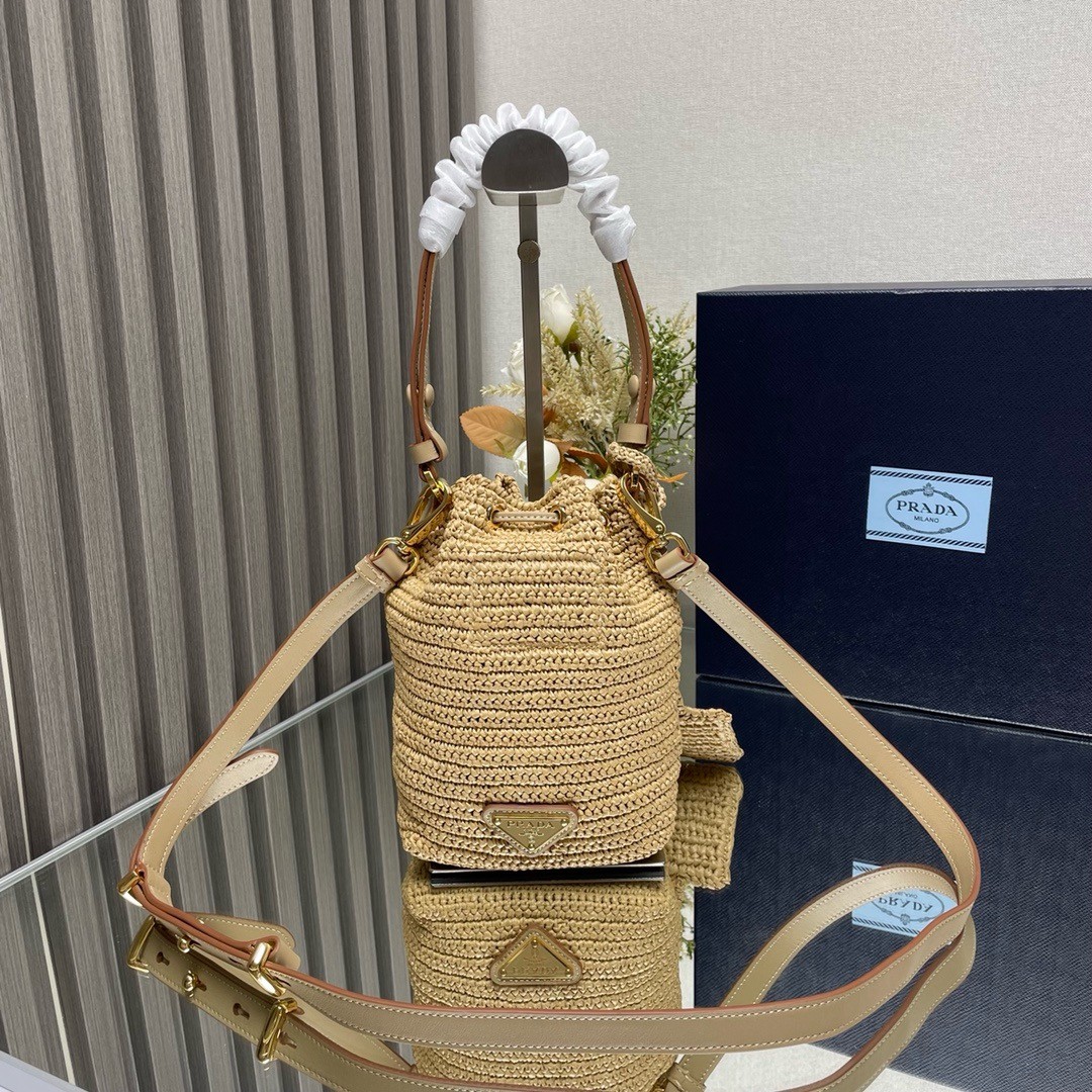 Pra*a crochet mini bucket bag in natural raffia-effect yarn