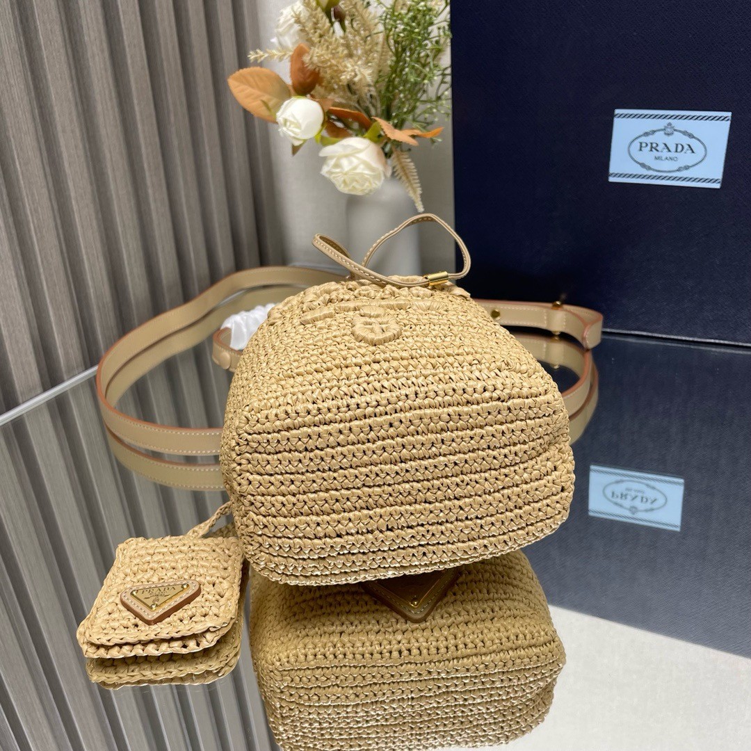 Pra*a crochet mini bucket bag in natural raffia-effect yarn
