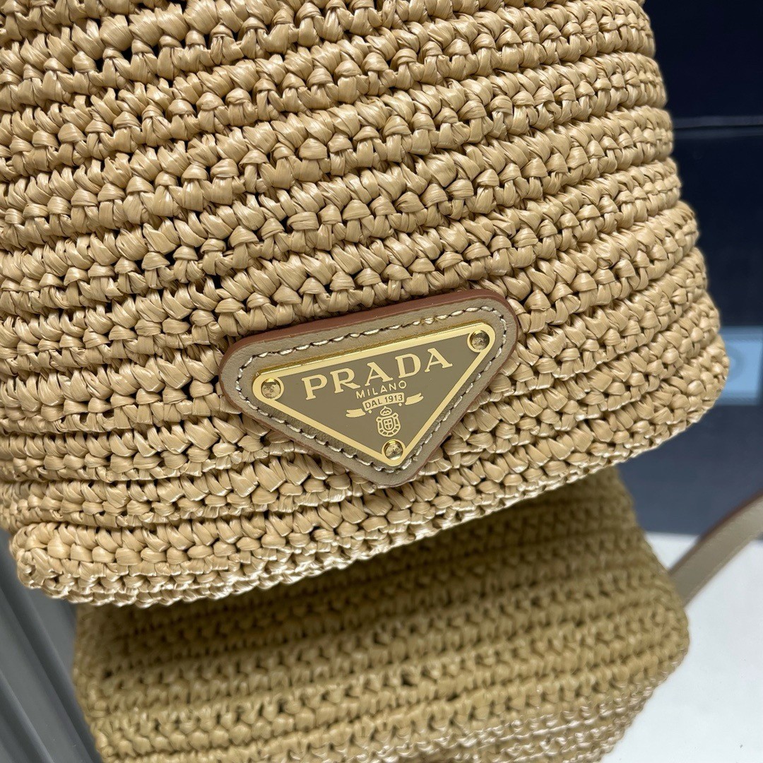 Pra*a crochet mini bucket bag in natural raffia-effect yarn