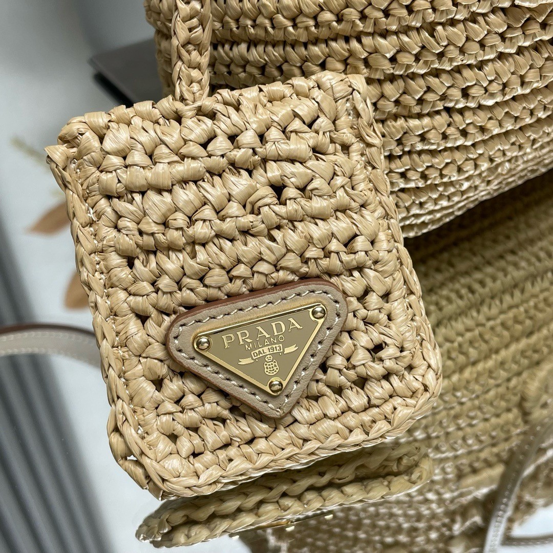 Pra*a crochet mini bucket bag in natural raffia-effect yarn