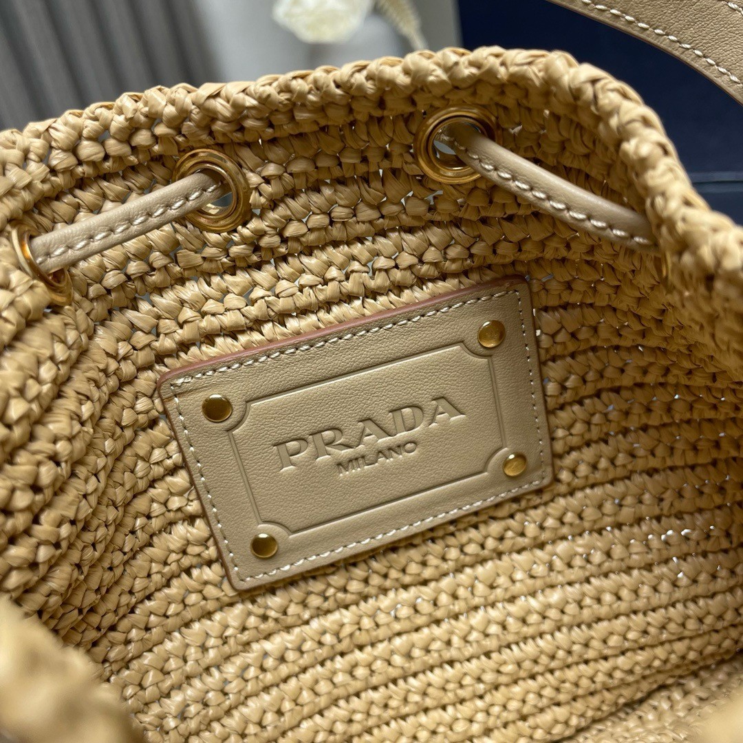 Pra*a crochet mini bucket bag in natural raffia-effect yarn