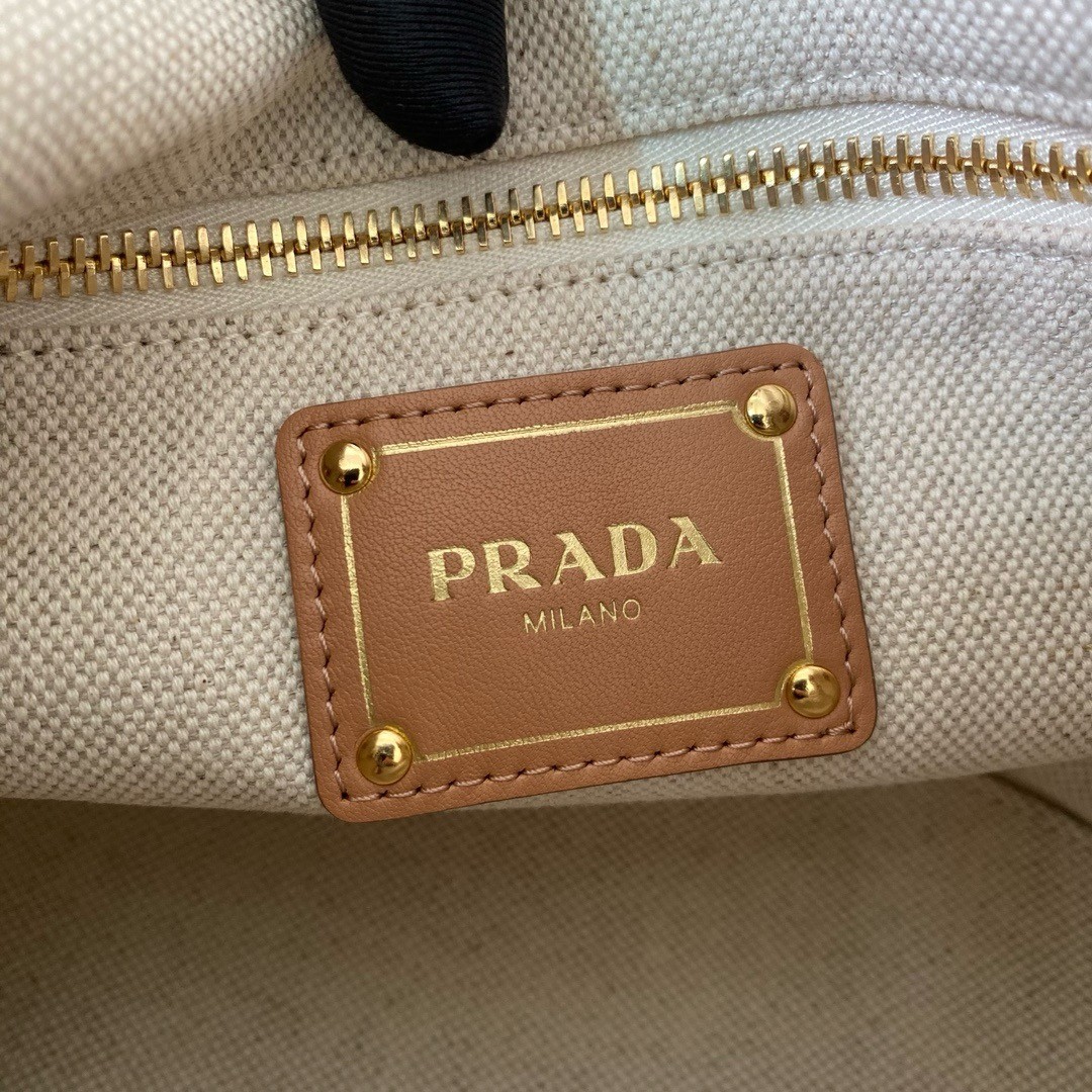 Pra*a mini buckle bag in linen blend and leather