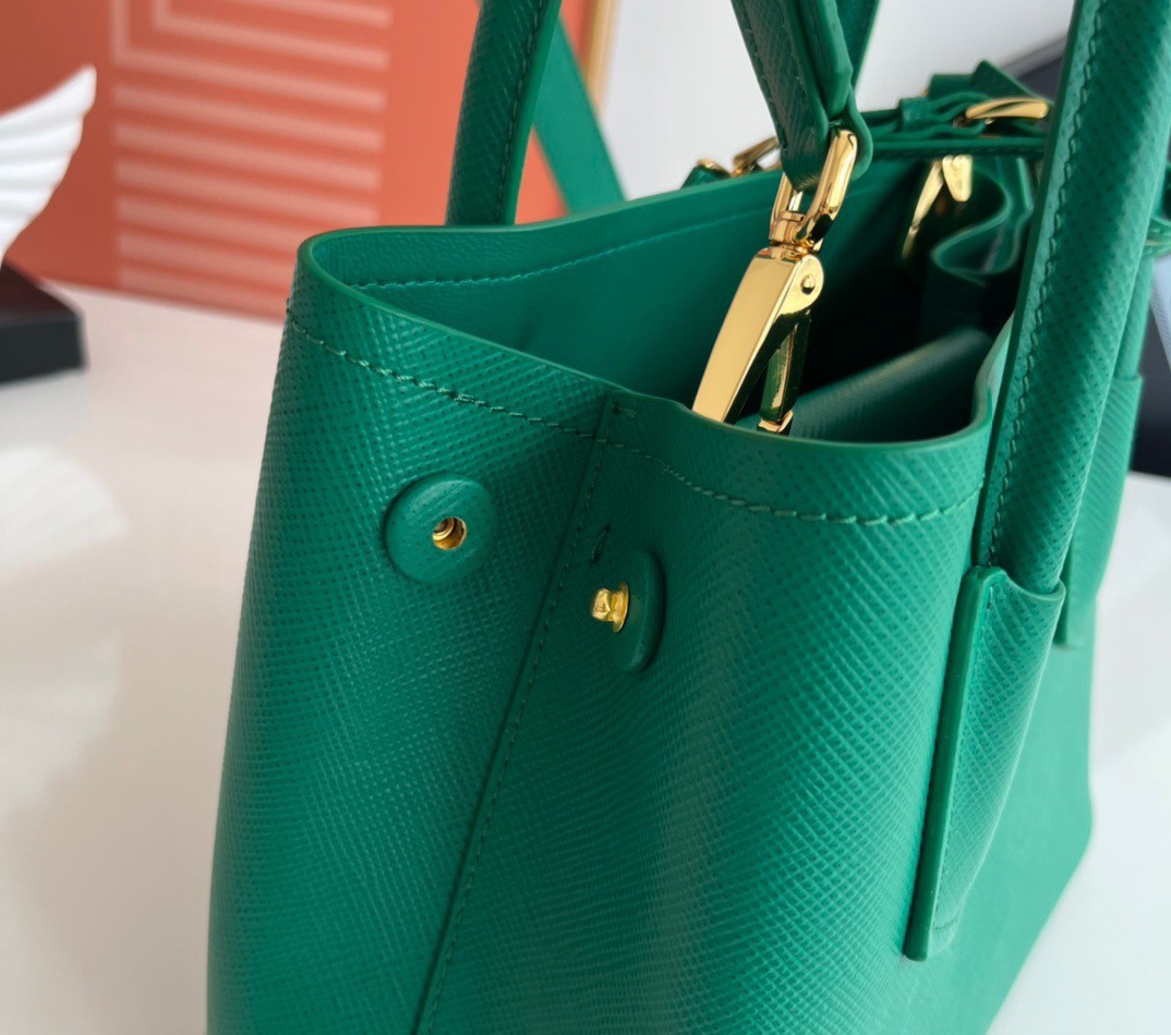 Pra*a double mini bag in green saffiano leather