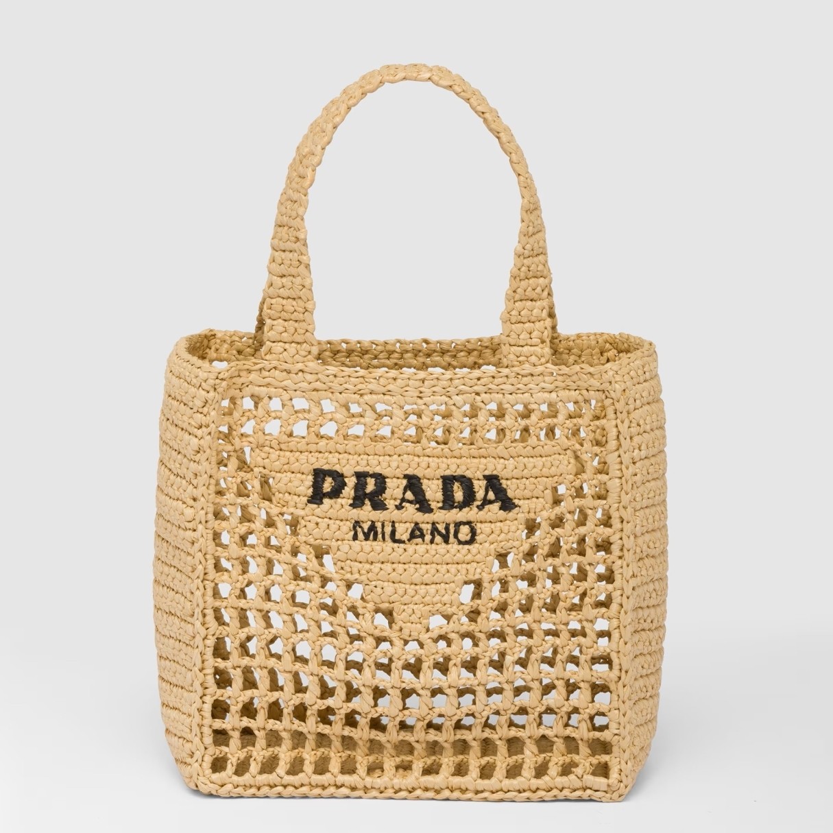 Pra*a small crochet tote in beige raffia-effect yarn