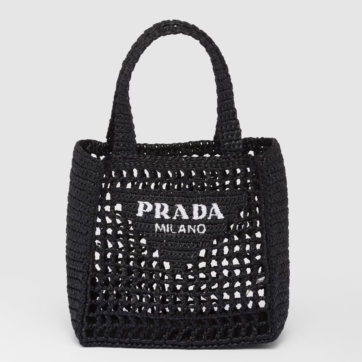 Pra*a small crochet tote in black raffia-effect yarn