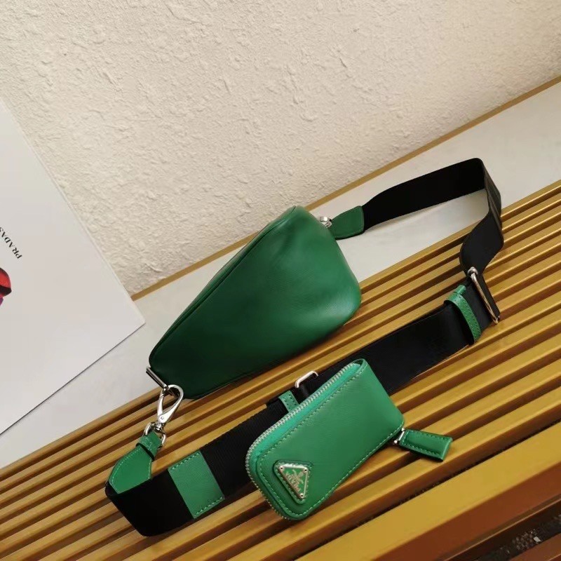 Pra*a triangle shoulder bag in green leather