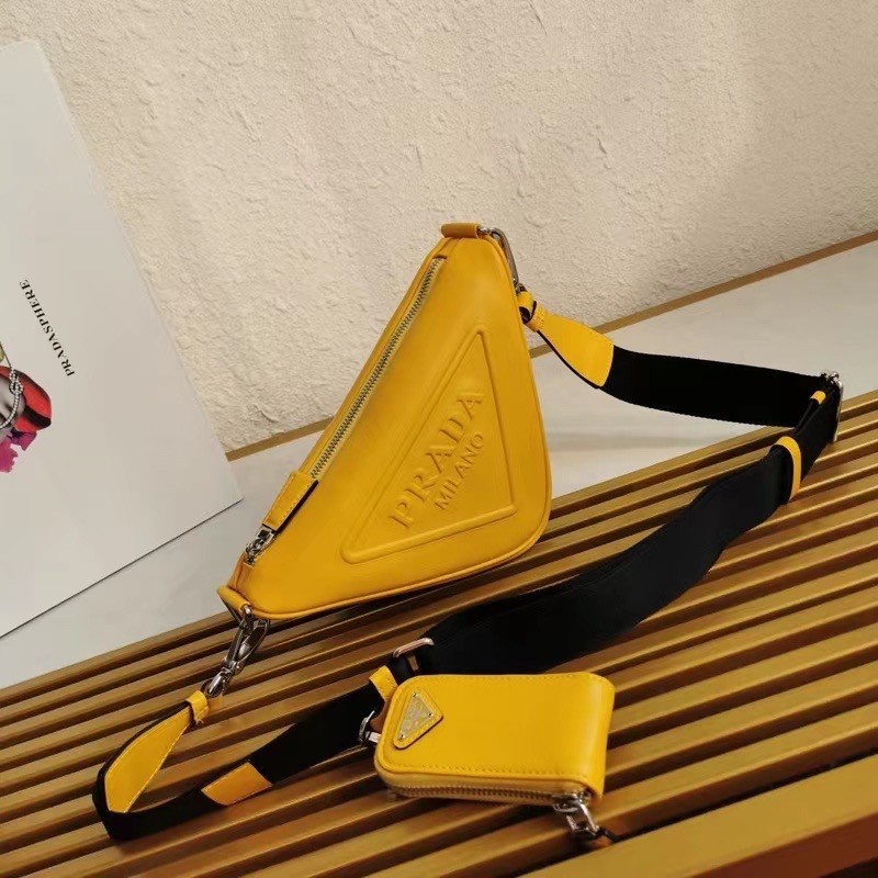 Pra*a triangle shoulder bag in yellow leather